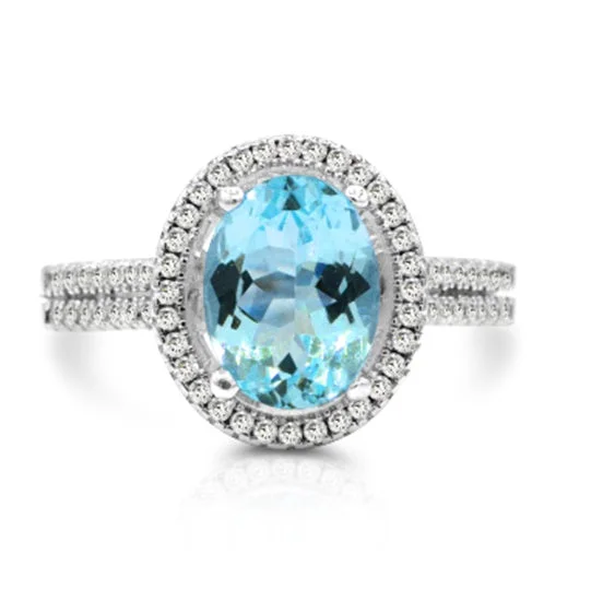 Striated design ring-9X7MM Oval Blue Topaz and White Topaz Halo Ring in Sterling Silver